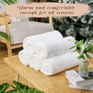 A table with some white towels on it